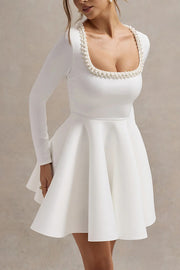 Playful Elegance Pearl Embellished Trim Long Sleeve Pleated Mini Dress