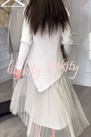 Jensine Ribbed Knit Long Sleeve Irregular Hem Loose Sweater