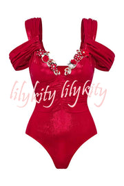 Solid Color Shiny Fabric Deep V Metal Embellished Stretch One-piece Swimsuit